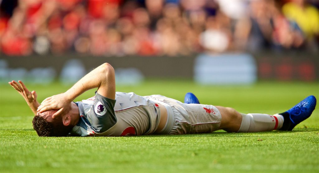 MANCHESTER, ENGLAND - Sunday, February 24, 2019: Liverpool's Andy Robertson lies injured during the FA Premier League match between Manchester United FC and Liverpool FC at Old Trafford. (Pic by David Rawcliffe/Propaganda)