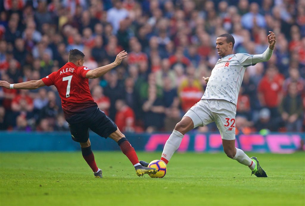 MANCHESTER, ENGLAND - Sunday, February 24, 2019: Manchester United's Alexis Sánchez (L) and Liverpool's Joel Matip during the FA Premier League match between Manchester United FC and Liverpool FC at Old Trafford. (Pic by David Rawcliffe/Propaganda)