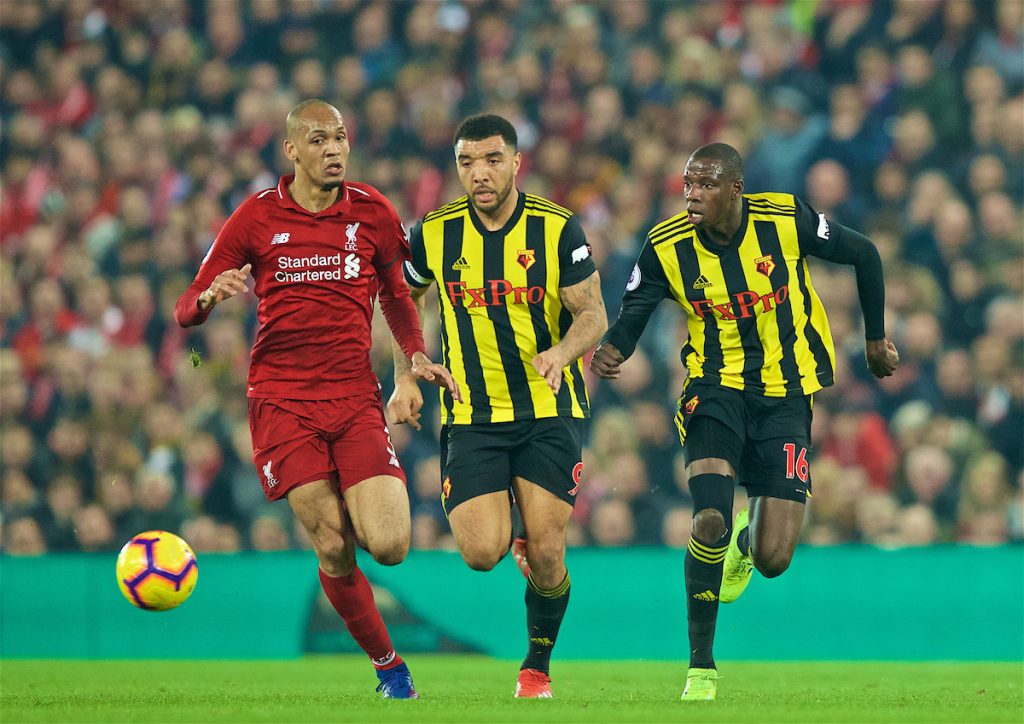 LIVERPOOL, ENGLAND - Wednesday, February 27, 2019: Liverpool's Fabio Henrique Tavares 'Fabinho' is chased down by Watford's captain Troy Deeney (C) and Abdoulaye Doucouré (R) during the FA Premier League match between Liverpool FC and Watford FC at Anfield. (Pic by Paul Greenwood/Propaganda)