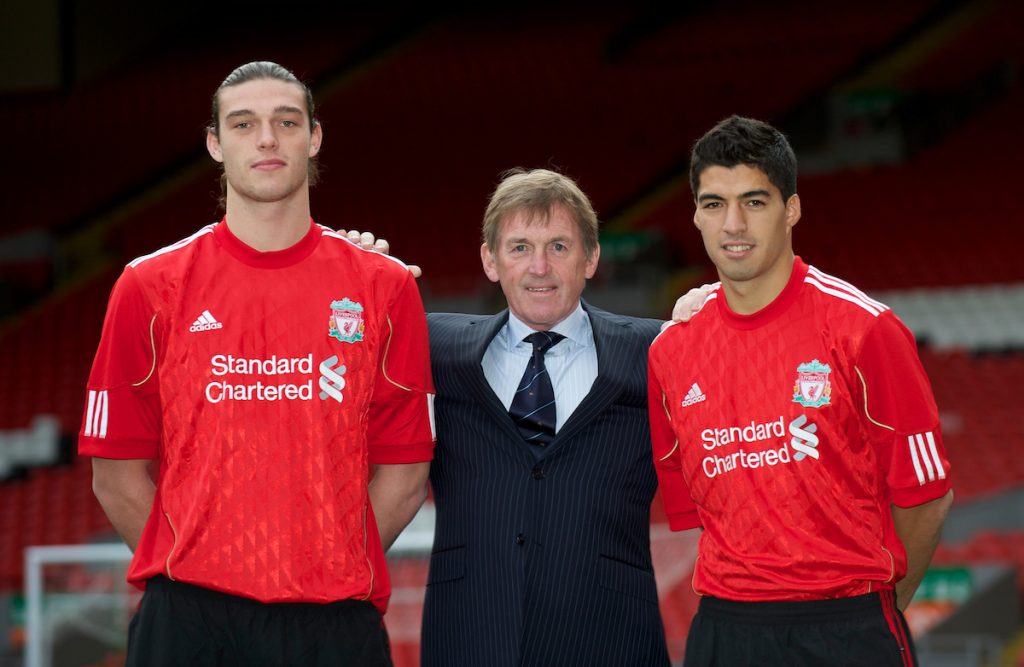 LIVERPOOL, ENGLAND - Thursday, February 3, 2011: Liverpool's new sigingings Luis Suarez and Andy Carroll with manager Kenny Dalglish during a photo-call at Anfield. Suarez signed from Ajax for £22.8m whilst Carroll arrived from Newcastle United for a club record fee of £35m. (Photo by David Rawcliffe/Propaganda)