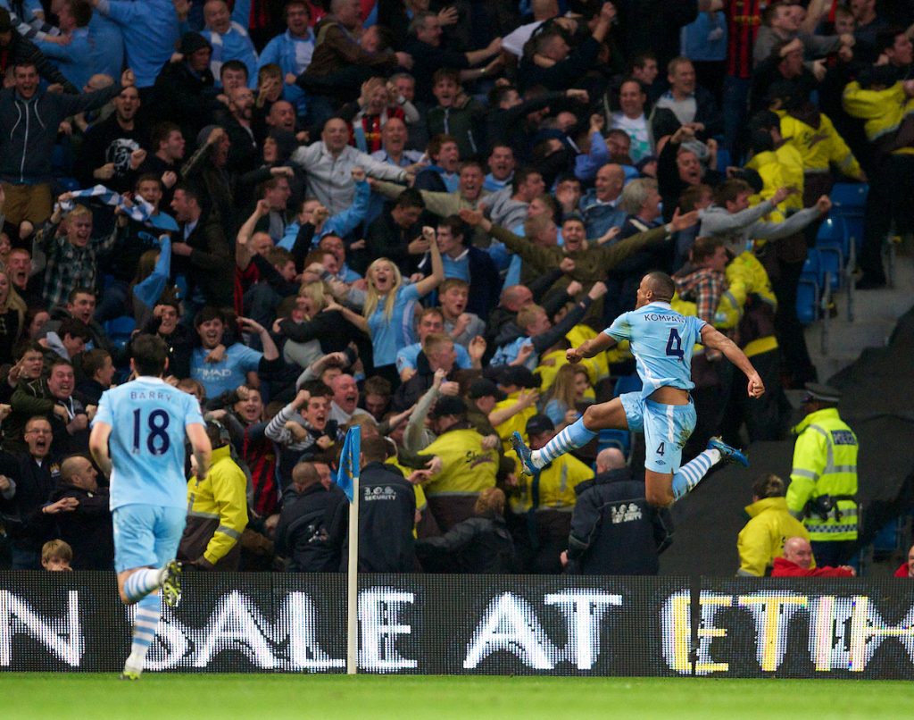 MANCHESTER, ENGLAND - Monday, April 30, 2012: Manchester City's Vincent Kompany celebrates scoring the first goal against Manchester United during the Premiership match at the City of Manchester Stadium. (Pic by David Rawcliffe/Propaganda)