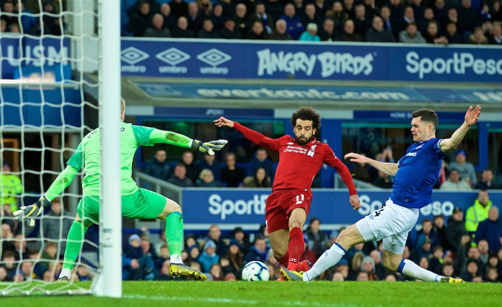 LIVERPOOL, ENGLAND - Sunday, March 3, 2019: Liverpool's Mohamed Salah is denied by Everton's Michael Keane during the FA Premier League match between Everton FC and Liverpool FC, the 233rd Merseyside Derby, at Goodison Park. (Pic by Paul Greenwood/Propaganda)