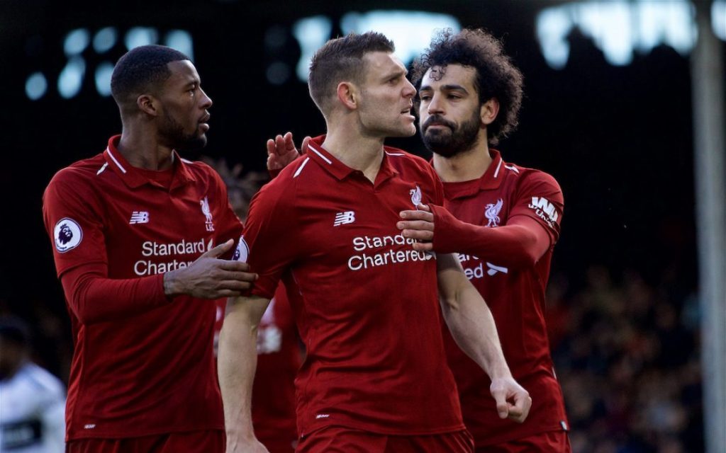 LONDON, ENGLAND - Sunday, March 17, 2019: Liverpool's captain James Milner (C) celebrates scoring the second goal from a penalty kick with team-mates Georginio Wijnaldum (L) and Mohamed Salah (R) during the FA Premier League match between Fulham FC and Liverpool FC at Craven Cottage. (Pic by David Rawcliffe/Propaganda)