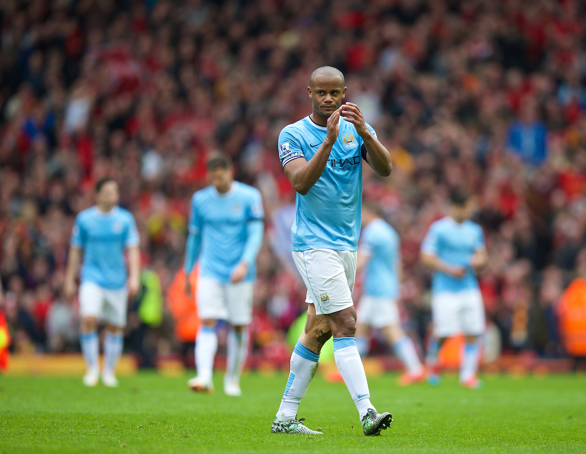 LIVERPOOL, ENGLAND - Sunday, April 13, 2014: Manchester City's Vincent Kompany looks dejected as his side lose 3-2 to Liverpool during the Premiership match at Anfield. (Pic by David Rawcliffe/Propaganda)