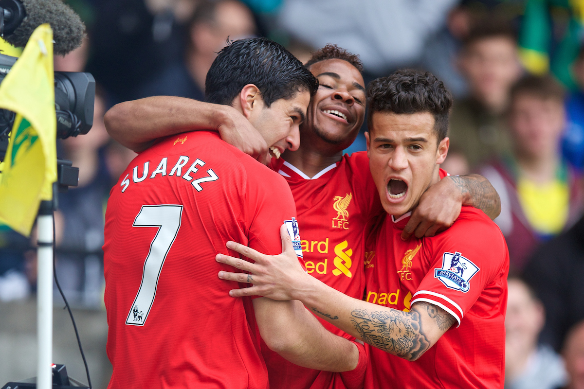 NORWICH, ENGLAND - Sunday, April 20, 2014: Liverpool's Luis Suarez celebrates scoring the second goal against Norwich City with team-mates Raheem Sterling and Philippe Coutinho Correia during the Premiership match at Carrow Road. (Pic by David Rawcliffe/Propaganda)