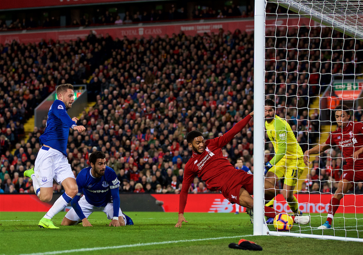 LIVERPOOL, ENGLAND - Sunday, December 2, 2018: Liverpool's Joe Gomez clears the ball off the line as Everton's Andre Gomes and captain Gylfi Sigurdsson look on during the FA Premier League match between Liverpool FC and Everton FC at Anfield, the 232nd Merseyside Derby. (Pic by Paul Greenwood/Propaganda)