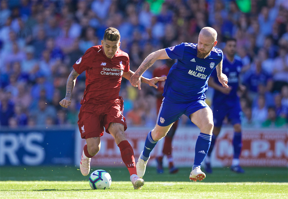 CARDIFF, WALES - Saturday, April 20, 2019: Liverpool's Roberto Firmino (L) and Cardiff City's goalkeeper Alex Smithies during the FA Premier League match between Cardiff City FC and Liverpool FC at the Cardiff City Stadium. (Pic by David Rawcliffe/Propaganda)