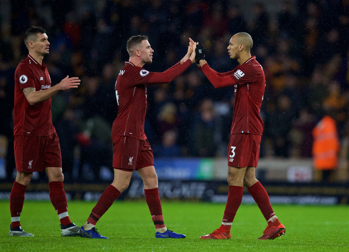 WOLVERHAMPTON, ENGLAND - Friday, December 21, 2018: Liverpool's Dejan Lovren, captain Jordan Henderson and Fabio Henrique Tavares 'Fabinho' celebrate after the 2-0 victory during the FA Premier League match between Wolverhampton Wanderers FC and Liverpool FC at Molineux Stadium. (Pic by David Rawcliffe/Propaganda)