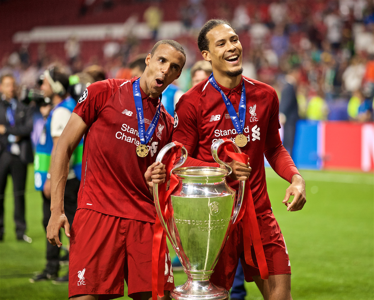 MADRID, SPAIN - SATURDAY, JUNE 1, 2019: Liverpool's Joel Matip (L) and Virgil van Dijk (R) after the UEFA Champions League Final match between Tottenham Hotspur FC and Liverpool FC at the Estadio Metropolitano. Liverpool won 2-0 to win their sixth European Cup. (Pic by David Rawcliffe/Propaganda)