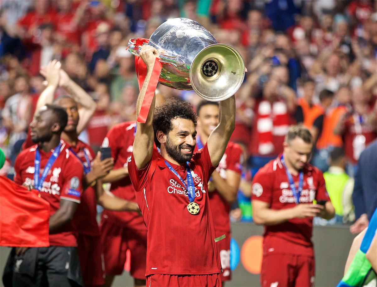 MADRID, SPAIN - SATURDAY, JUNE 1, 2019: Liverpool's goalscorer Mohamed Salah celebrates with the cup after the UEFA Champions League Final match between Tottenham Hotspur FC and Liverpool FC at the Estadio Metropolitano. Liverpool won 2-0 to win their sixth European Cup. (Pic by David Rawcliffe/Propaganda)