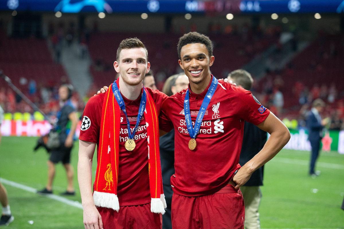 MADRID, SPAIN - SATURDAY, JUNE 1, 2019: Liverpool's Andy Robertson (L) and Trent Alexander-Arnold after the UEFA Champions League Final match between Tottenham Hotspur FC and Liverpool FC at the Estadio Metropolitano. Liverpool won 2-0 to win their sixth European Cup. (Pic by Peter Makadi/Propaganda)