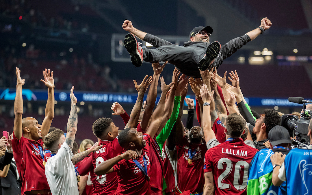 MADRID, SPAIN - SATURDAY, JUNE 1, 2019: Liverpool's players throw Liverpool Manager Jurgen Klopp in the air as they celebrate a 2-0 victory in the UEFA Champions League Final match between Tottenham Hotspur FC and Liverpool FC at the Estadio Metropolitano. (Pic by Paul Greenwood/Propaganda)