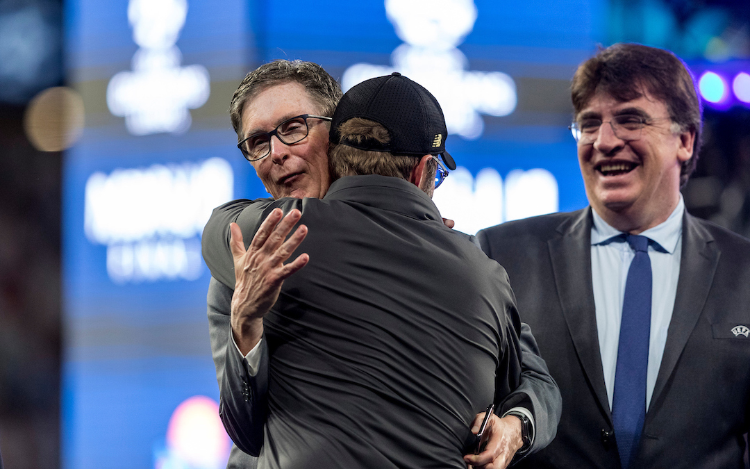 Liverpool's manager Jürgen Klopp is embraced by owner John W Henry following a 2-0 victory in the UEFA Champions League Final match between Tottenham Hotspur FC and Liverpool FC at the Estadio Metropolitano