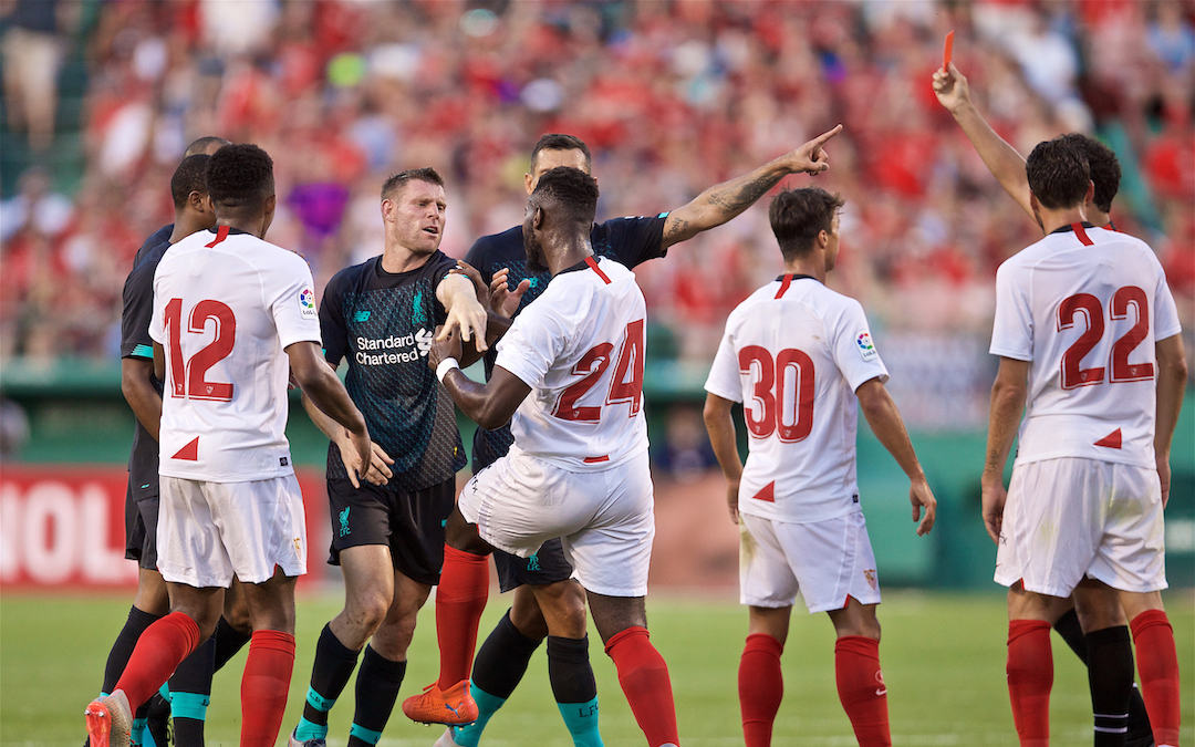 BOSTON, MASSACHUSETTS, USA - Sunday, July 21, 2019: Liverpool's James Milner clashes with Sevilla FC's Joris Gnagnon after his challenge injured Yasser Larouci during a friendly against Sevilla FC at Fenway Park on day six of the club's pre-season tour of America. (Pic by David Rawcliffe/Propaganda)