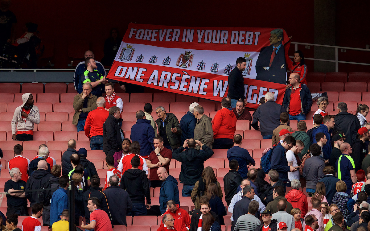 LONDON, ENGLAND - Sunday, April 2, 2017: Arsenal's supporters hold aloft a banner supporting manager Arsene Wenger "Forever In Your Debt One Arsene Wenger" after the 2-2 draw with Manchester City the FA Premier League match at the Emirates Stadium. (Pic by David Rawcliffe/Propaganda)