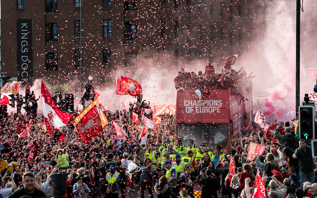 Liverpool’s captain Jordan Henderson holds the Champions League Trophy during an open-top bus parade through the city after winning the UEFA Champions League Final. Liverpool beat Tottenham Hotspur. 2-0 in Madrid. To claim their sixth European Cup.