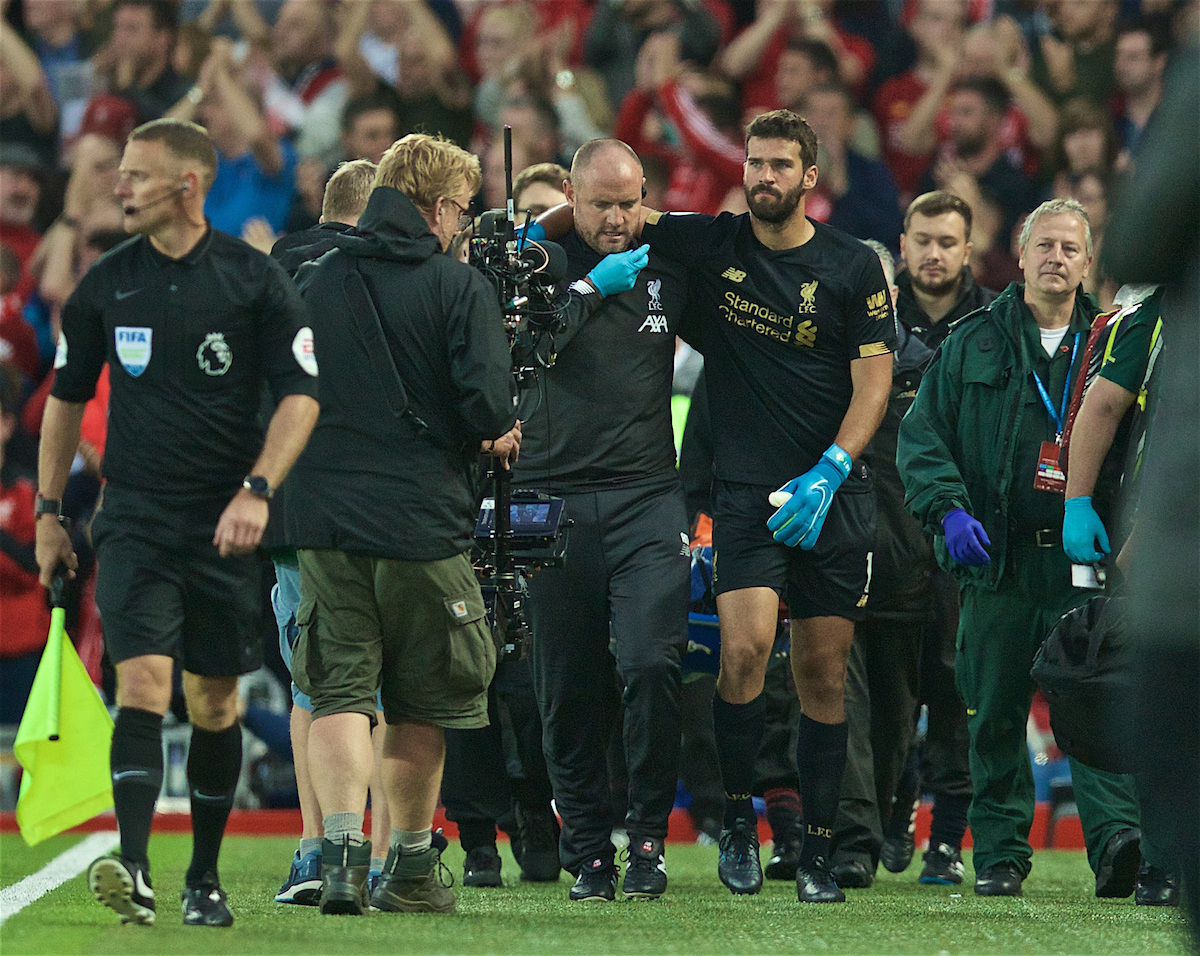 LIVERPOOL, ENGLAND - Friday, August 9, 2019: Liverpool's goalkeeper Alisson Becker goes off injured during the opening FA Premier League match of the season between Liverpool FC and Norwich City FC at Anfield. (Pic by David Rawcliffe/Propaganda)