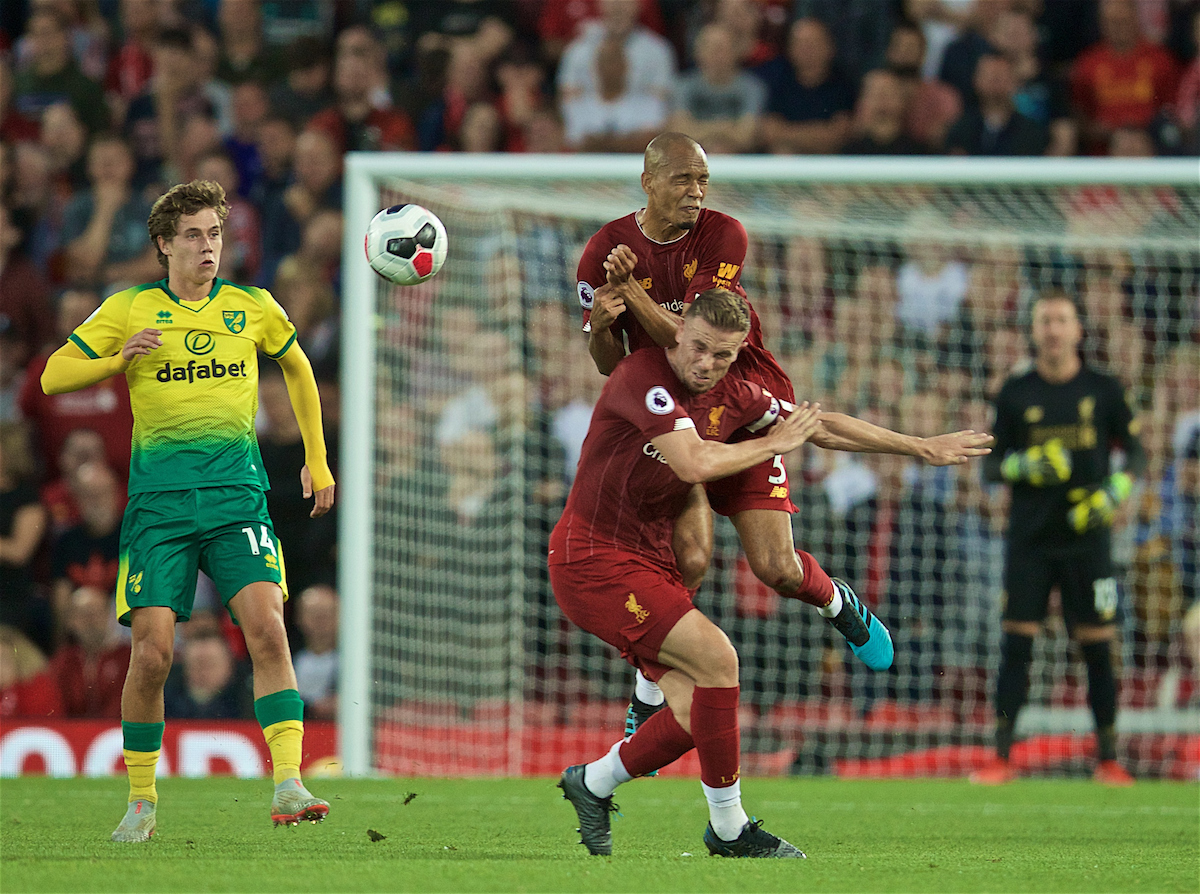 LIVERPOOL, ENGLAND - Friday, August 9, 2019: Liverpool's Fabio Henrique Tavares 'Fabinho' and captain Jordan Henderson clash during the opening FA Premier League match of the season between Liverpool FC and Norwich City FC at Anfield. (Pic by David Rawcliffe/Propaganda)