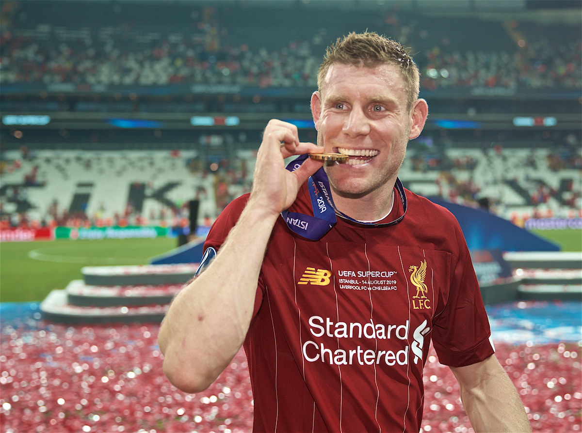 ISTANBUL, TURKEY - Wednesday, August 14, 2019: Liverpool's James Milner bites his winners' medal as he celebrates after winning the Super Cup during the UEFA Super Cup match between Liverpool FC and Chelsea FC at Besiktas Park. Liverpool won 5-4 on penalties after a 1-1 draw. (Pic by David Rawcliffe/Propaganda)