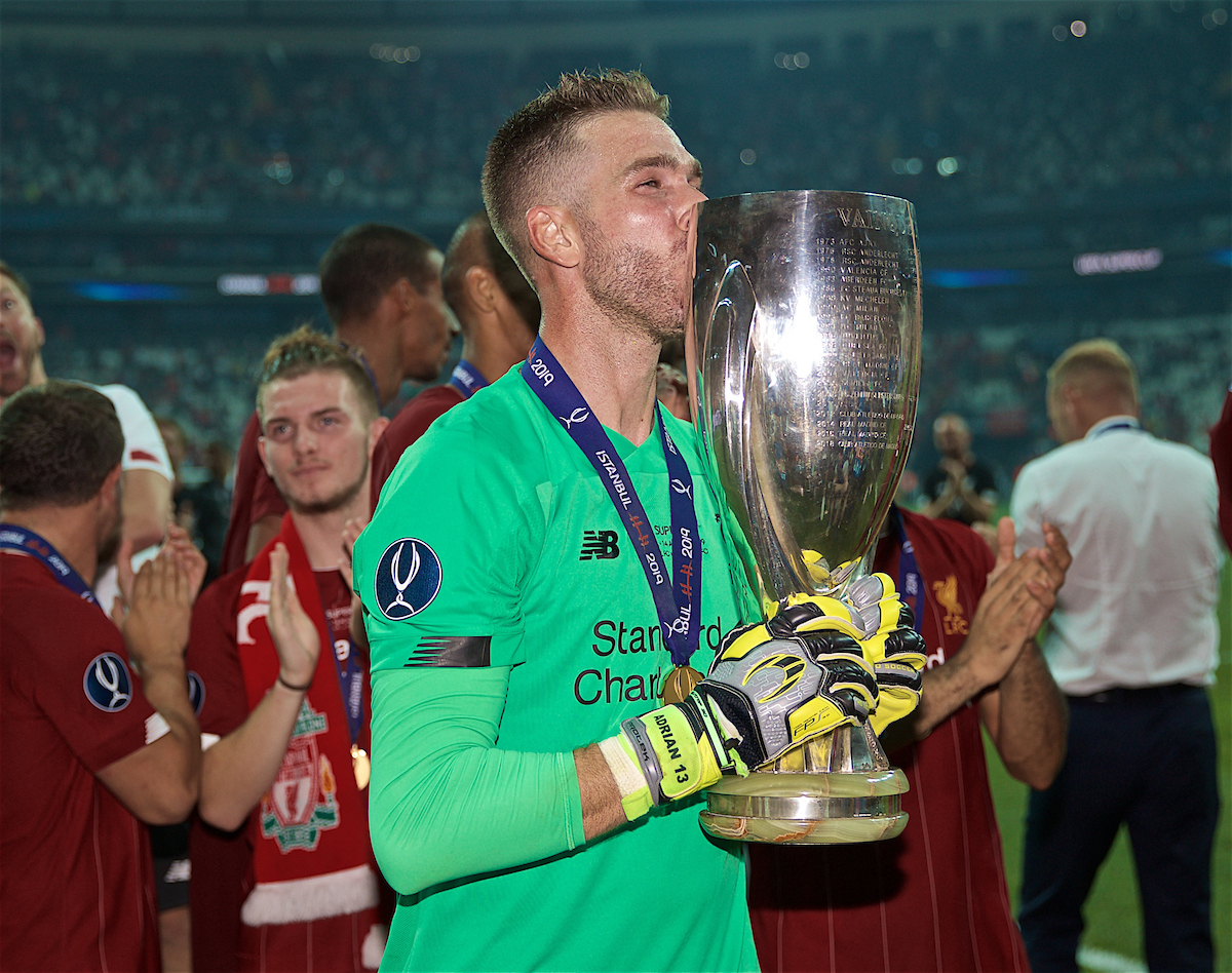 ISTANBUL, TURKEY - Wednesday, August 14, 2019: Liverpool's goalkeeper Adrián San Miguel del Castillo kisses the trophy after his save in the shoot-out won the Super Cup after the UEFA Super Cup match between Liverpool FC and Chelsea FC at Besiktas Park. Liverpool won 5-4 on penalties after a 1-1 draw. (Pic by David Rawcliffe/Propaganda)