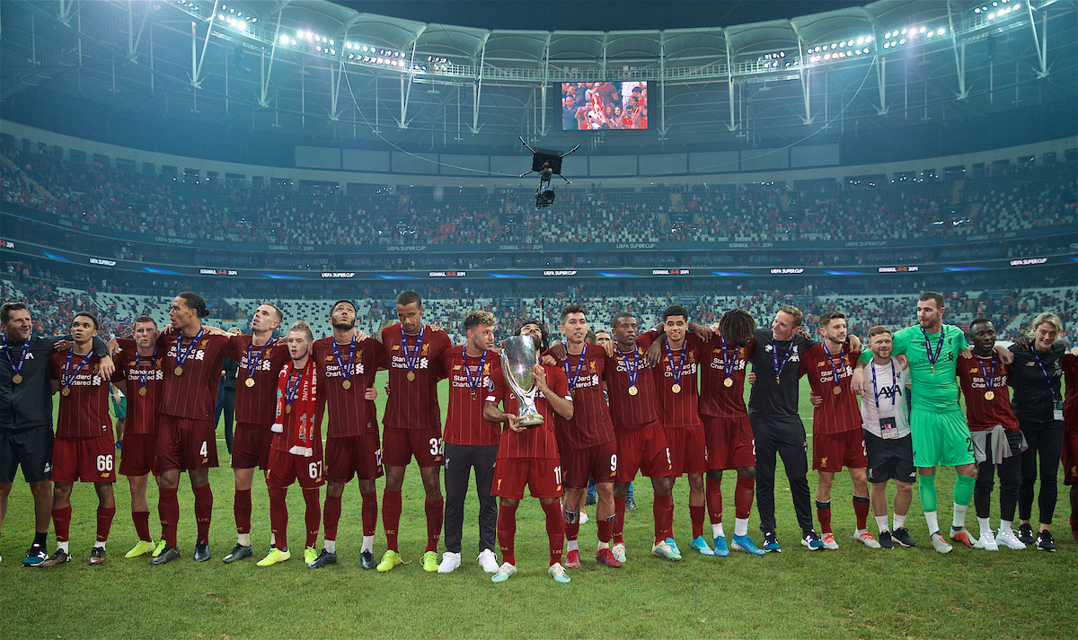 ISTANBUL, TURKEY - Wednesday, August 14, 2019: Liverpool's Mohamed Salah celebrates with the trophy after winning the Super Cup after the UEFA Super Cup match between Liverpool FC and Chelsea FC at Besiktas Park. Liverpool won 5-4 on penalties after a 1-1 draw. Trent Alexander-Arnold, James Milner, Virgil van Dijk, captain Jordan Henderson, Harvey Elliott, Joe Gomez, Joel Matip, Alex Oxlade-Chamberlain, Mohamed Salah, Roberto Firmino, Georginio Wijnaldum, Ki-Jana Hoever, Divock Origi, first-team development coach Pepijn Lijnders, Adam Lallana, goalkeeper Andy Lonergan. (Pic by David Rawcliffe/Propaganda)