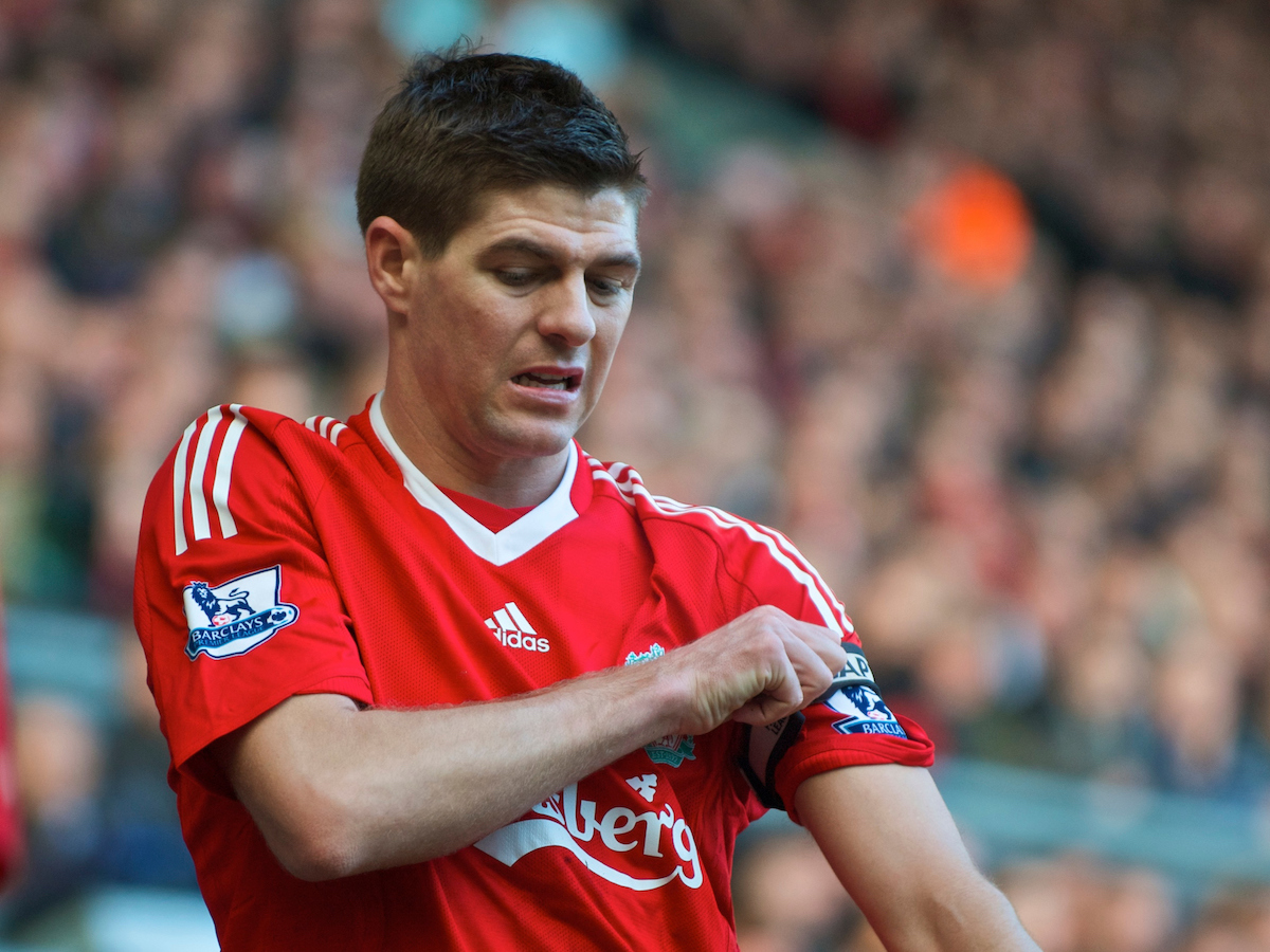 LIVERPOOL, ENGLAND - Saturday, February 6, 2010: Liverpool's captain Steven Gerrard MBE adjusts his armband, the week he was made England vice-captain after John Terry was sacked as England captain after an adulteress affair with a team-mate's partner. (Photo by: David Rawcliffe/Propaganda)