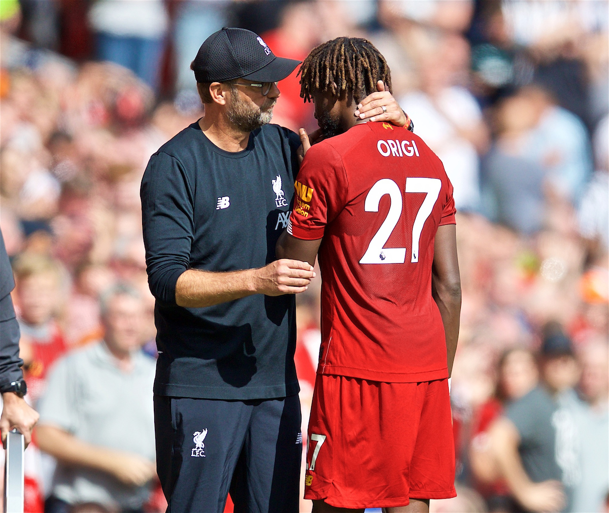 LIVERPOOL, ENGLAND - Saturday, September 14, 2019: Liverpool's manager Jürgen Klopp speaks with Divock Origi as he is substituted with an injury during the FA Premier League match between Liverpool FC and Newcastle United FC at Anfield. (Pic by David Rawcliffe/Propaganda)