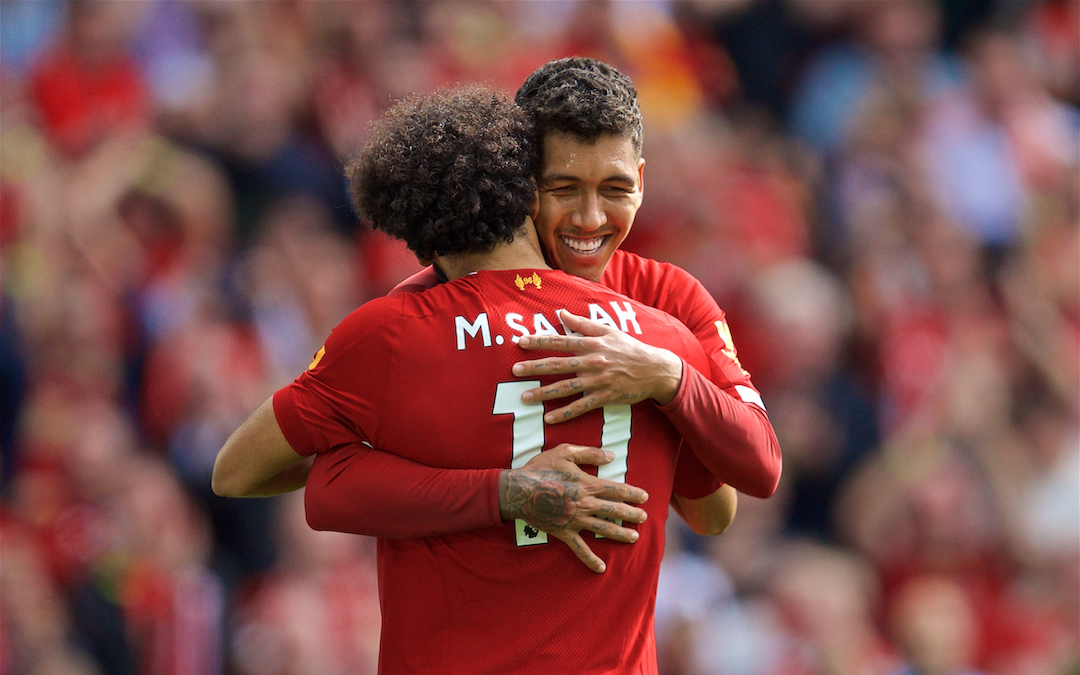 LIVERPOOL, ENGLAND - Saturday, September 14, 2019: Liverpool's Mohamed Salah (#11) celebrates scoring the third goal with team-mate Roberto Firmino during the FA Premier League match between Liverpool FC and Newcastle United FC at Anfield. (Pic by David Rawcliffe/Propaganda)