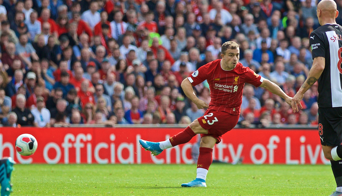 LIVERPOOL, ENGLAND - Saturday, September 14, 2019: Liverpool's substitute Xherdan Shaqiri makes a Roberto Firmino-esque 'no look' pass during the FA Premier League match between Liverpool FC and Newcastle United FC at Anfield. (Pic by David Rawcliffe/Propaganda)