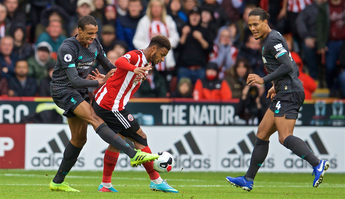 SHEFFIELD, ENGLAND - Thursday, September 26, 2019: Liverpool's Joel Matip (L) tackles Sheffield United's Lys Mousset during the FA Premier League match between Sheffield United FC and Liverpool FC at Bramall Lane. (Pic by David Rawcliffe/Propaganda)