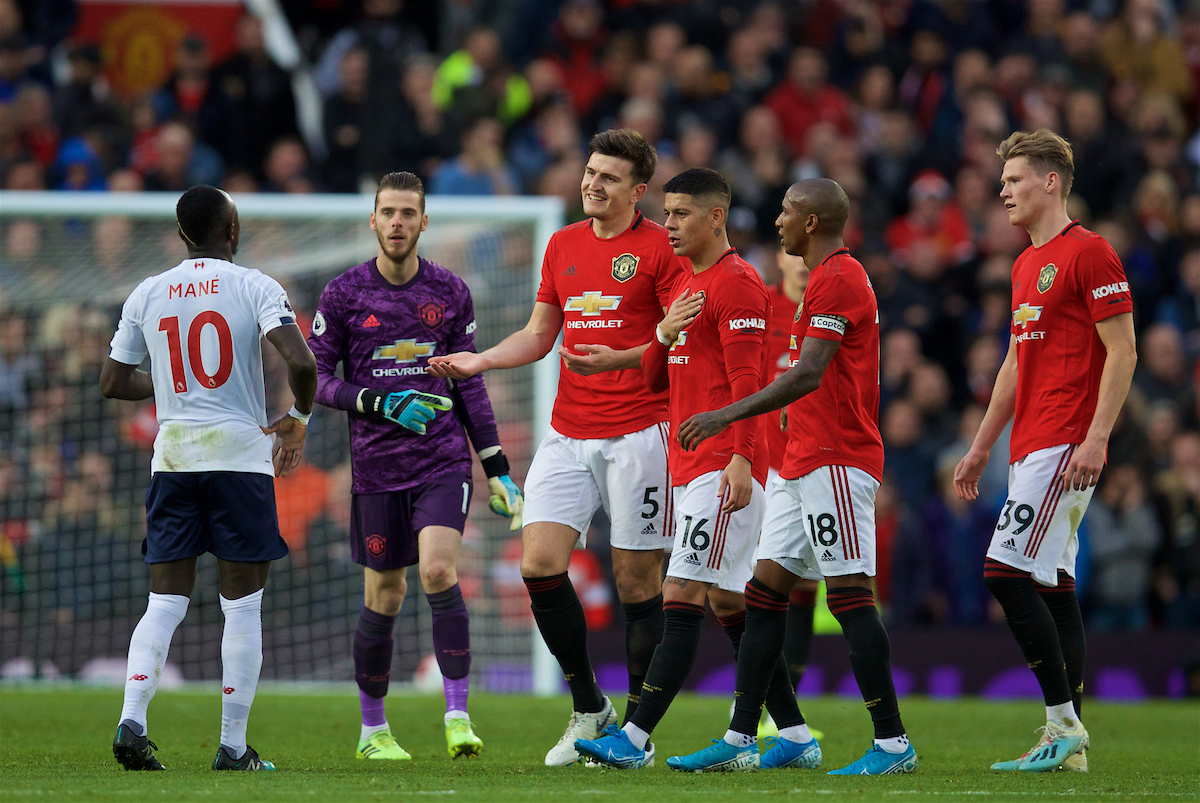 MANCHESTER, ENGLAND - Saturday, October 19, 2019: Manchester United players goalkeeper David de Gea, Harry Maguire, Marcos Rojo, Ashley Young and Scott McTominay rush to tell Liverpool's goalscorer Sadio Mane that his goal was disallowed by VAR during the FA Premier League match between Manchester United FC and Liverpool FC at Old Trafford. (Pic by David Rawcliffe/Propaganda)