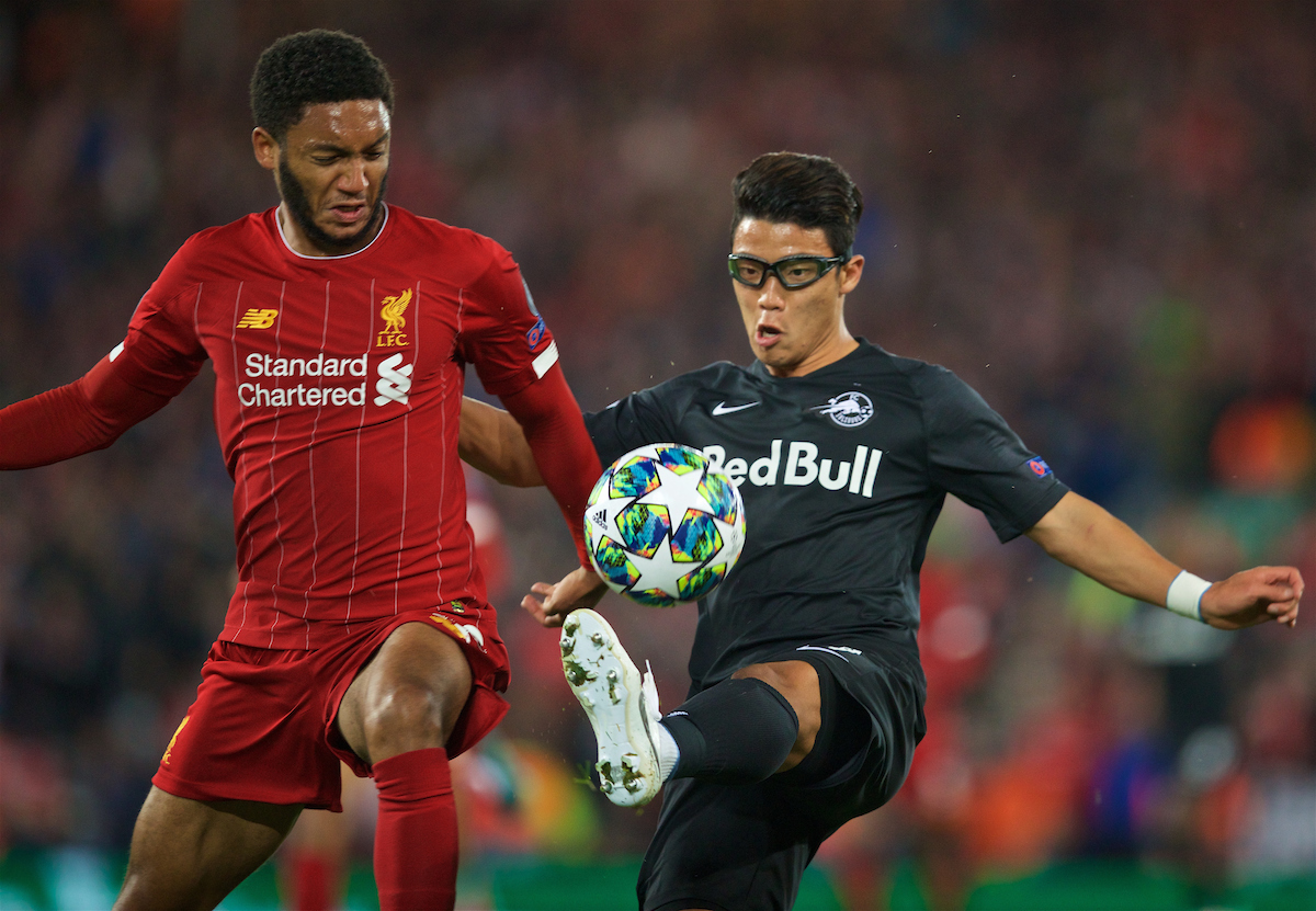 LIVERPOOL, ENGLAND - Wednesday, October 2, 2019: Liverpool's Joe Gomez (L) and FC Salzburg's Hee-Chan Hwang during the UEFA Champions League Group E match between Liverpool FC and FC Salzburg at Anfield. (Pic by David Rawcliffe/Propaganda)