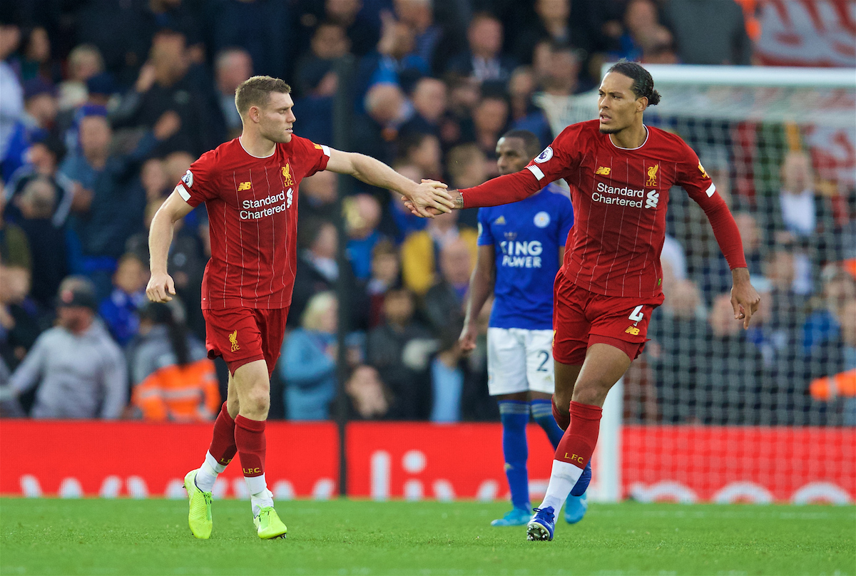 LIVERPOOL, ENGLAND - Saturday, October 5, 2019: Liverpool's James Milner (L) celebrates with team-mate Virgil van Dijk after scoring the winning second goal, an injury time penalty, during the FA Premier League match between Liverpool FC and Leicester City FC at Anfield. Liverpool won 2-1. (Pic by David Rawcliffe/Propaganda)