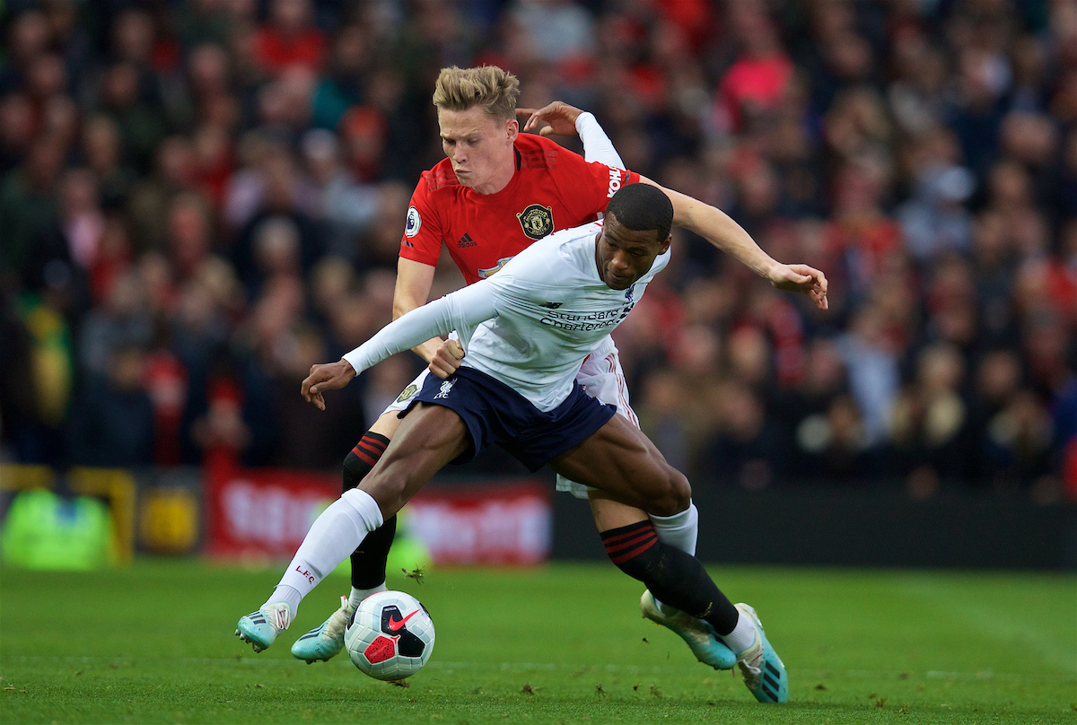 MANCHESTER, ENGLAND - Saturday, October 19, 2019: Manchester United's Scott McTominay (L) and Liverpool's Georginio Wijnaldum during the FA Premier League match between Manchester United FC and Liverpool FC at Old Trafford. (Pic by David Rawcliffe/Propaganda)