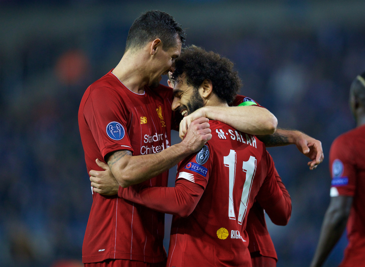 GENK, BELGIUM - Wednesday, October 23, 2019: Liverpool's Mohamed Salah (R) celebrates scoring the fourth goal with team-mate Dejan Lovren during the UEFA Champions League Group E match between KRC Genk and Liverpool FC at the KRC Genk Arena. (Pic by David Rawcliffe/Propaganda)