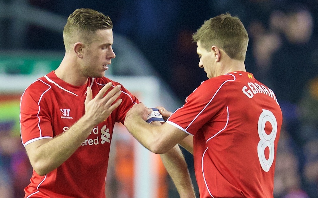 Liverpool's captain Steven Gerrard hands the armband to Jordan Henderson