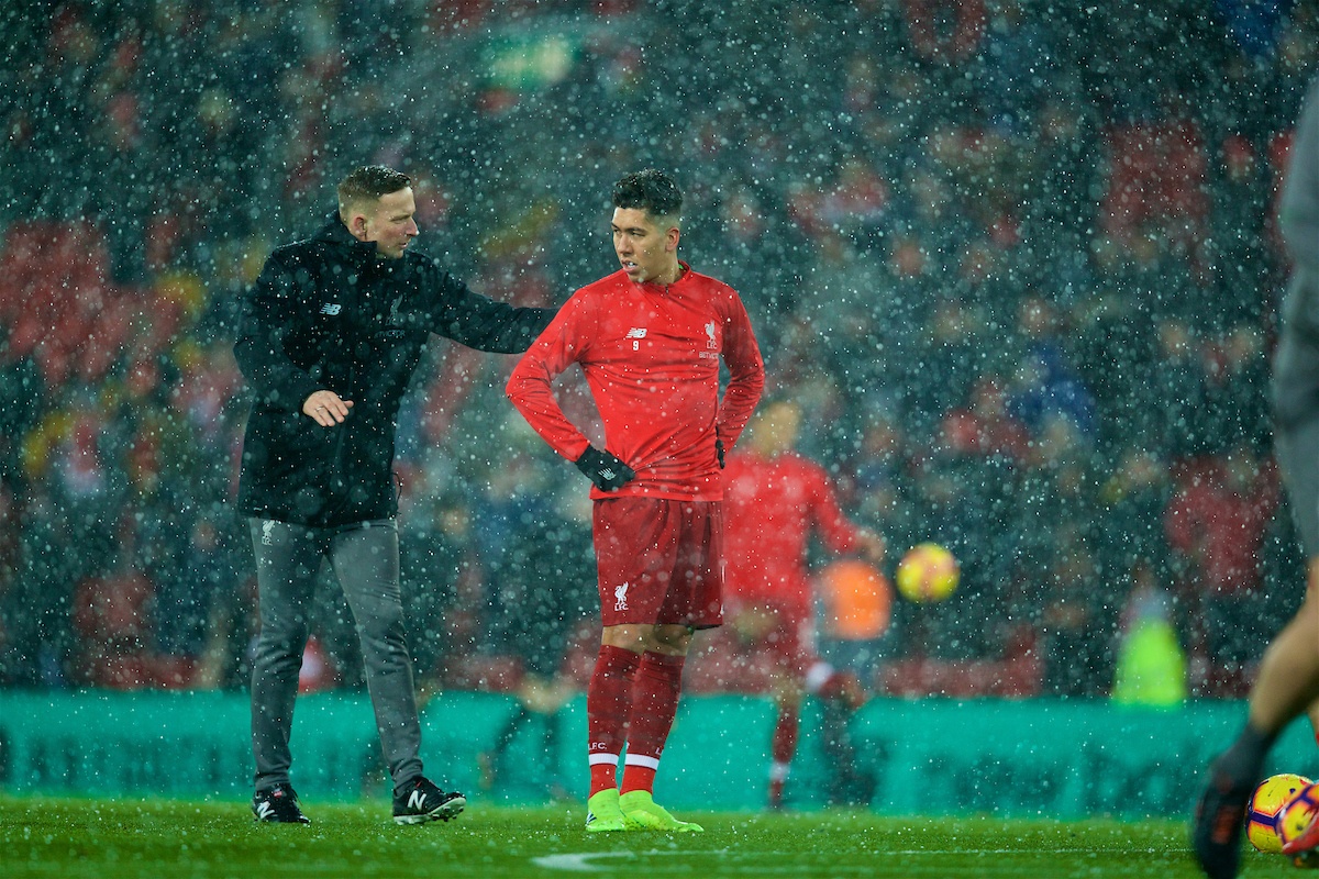 LIVERPOOL, ENGLAND - Wednesday, January 30, 2019: Liverpool's first-team development coach Pepijn Lijnders and Roberto Firmino in a snow storm during the pre-match warm-up before the FA Premier League match between Liverpool FC and Leicester City FC at Anfield. (Pic by David Rawcliffe/Propaganda)