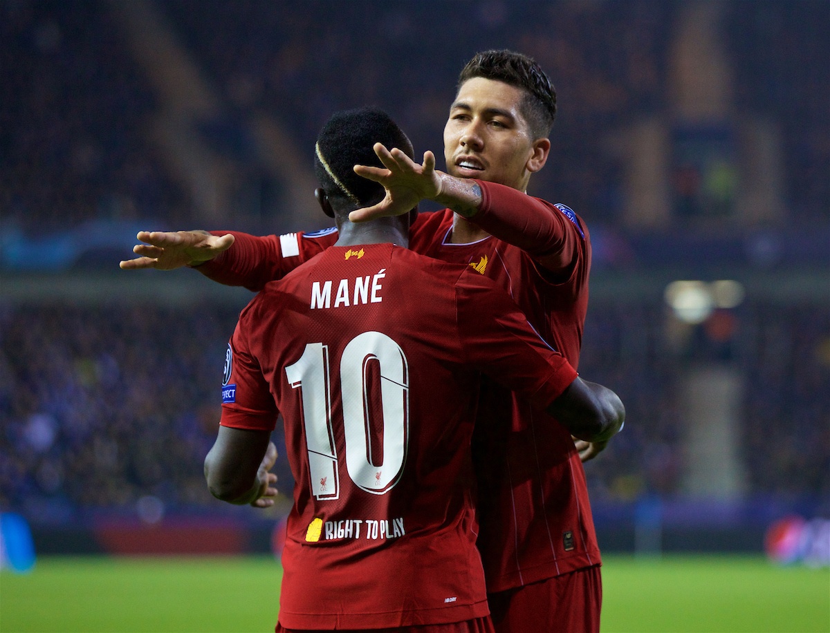 GENK, BELGIUM - Wednesday, October 23, 2019: Liverpool's Sadio Mané (L) celebrates scoring the third goal with team-mate Roberto Firmino during the UEFA Champions League Group E match between KRC Genk and Liverpool FC at the KRC Genk Arena. (Pic by David Rawcliffe/Propaganda)