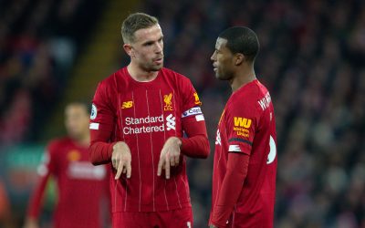 Liverpool's captain Jordan Henderson (L) speaks with Georginio Wijnaldum during the FA Premier League match between Liverpool FC and Brighton & Hove Albion FC at Anfield