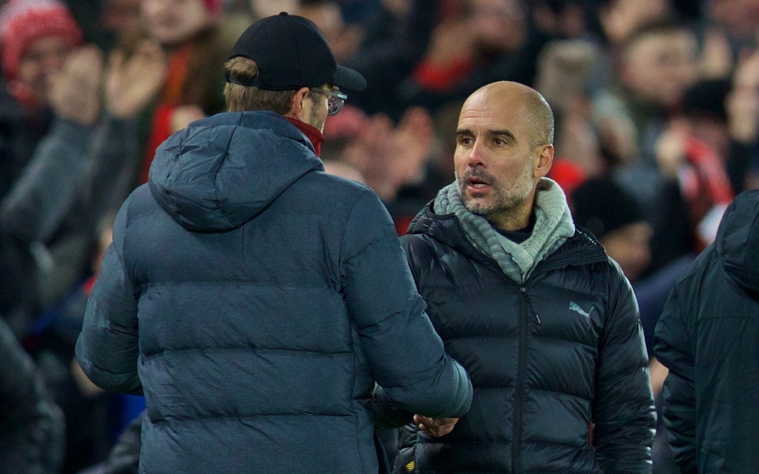 Manchester City's head coach Pep Guardiola (R) shakes hands with Liverpool's manager Jürgen Klopp after the FA Premier League match between Liverpool FC and Manchester City FC at Anfield