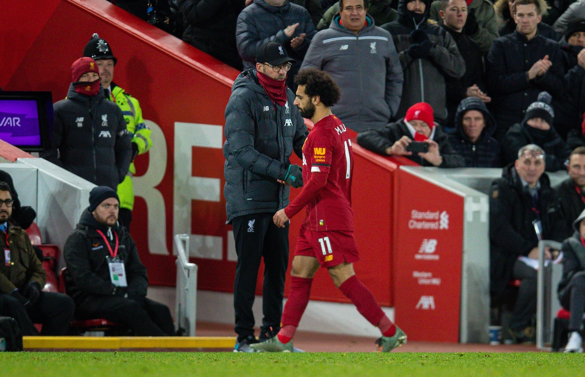 LIVERPOOL, ENGLAND - Saturday, November 30, 2019: Liverpool's Mohamed Salah shakes hands with manager Jürgen Klopp as he is substituted during the FA Premier League match between Liverpool FC and Brighton & Hove Albion FC at Anfield. (Pic by David Rawcliffe/Propaganda)