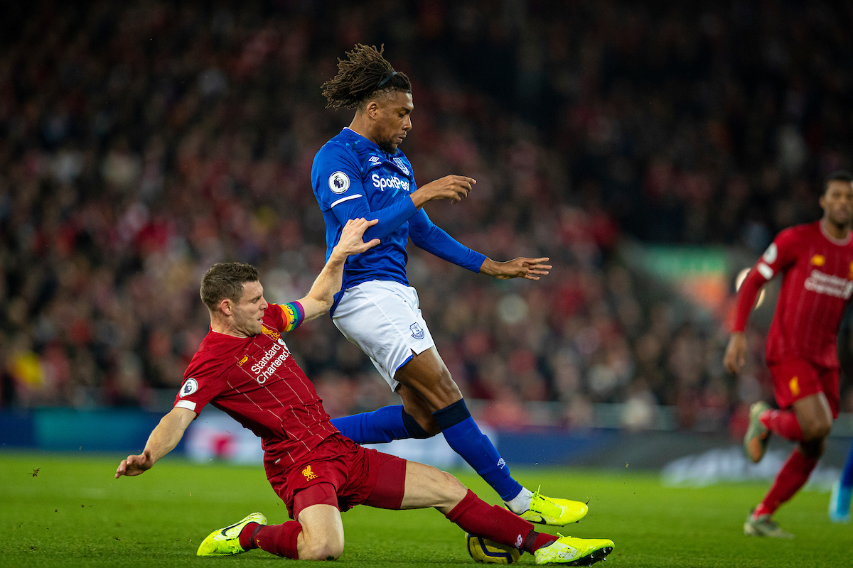 LIVERPOOL, ENGLAND - Wednesday, December 4, 2019: Liverpools James Milner (L) tackles Everton's Alex Iwobi during the FA Premier League match between Liverpool FC and Everton FC, the 234th Merseyside Derby, at Anfield. (Pic by David Rawcliffe/Propaganda)