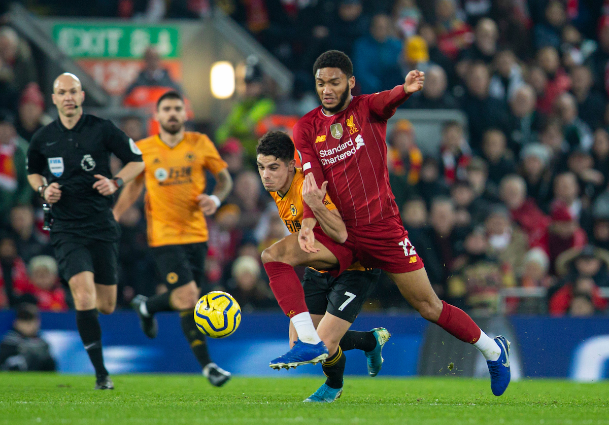 LIVERPOOL, ENGLAND - Sunday, December 29, 2019: Liverpool's Joe Gomez (R) and Wolverhampton Wanderers' Pedro Neto during the FA Premier League match between Liverpool FC and Wolverhampton Wanderers FC at Anfield. (Pic by Richard Roberts/Propaganda)