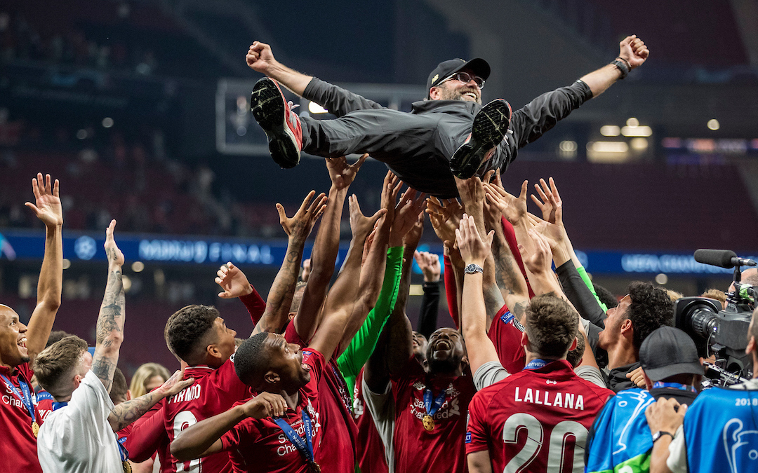 MADRID, SPAIN - SATURDAY, JUNE 1, 2019: Liverpool's players throw Liverpool Manager Jurgen Klopp in the air as they celebrate a 2-0 victory in the UEFA Champions League Final match between Tottenham Hotspur FC and Liverpool FC at the Estadio Metropolitano. (Pic by Paul Greenwood/Propaganda)