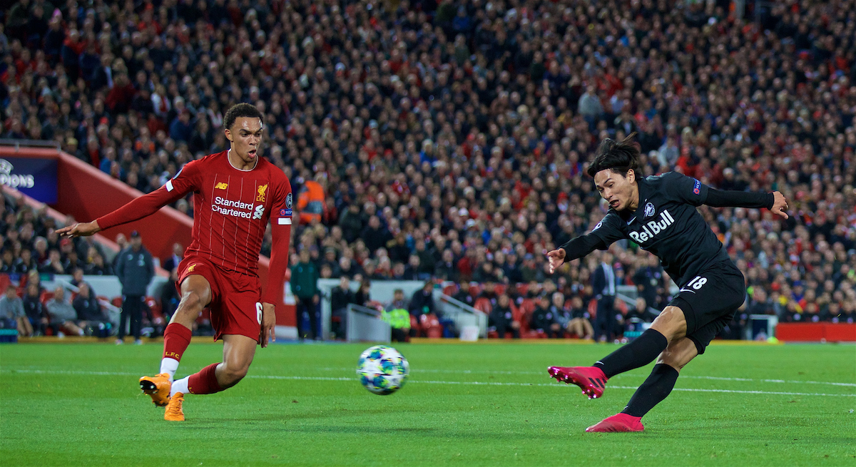 LIVERPOOL, ENGLAND - Wednesday, October 2, 2019: FC Salzburg's Takumi Minamino (R) shoots as Liverpool's Trent Alexander-Arnold looks on during the UEFA Champions League Group E match between Liverpool FC and FC Salzburg at Anfield. (Pic by David Rawcliffe/Propaganda)