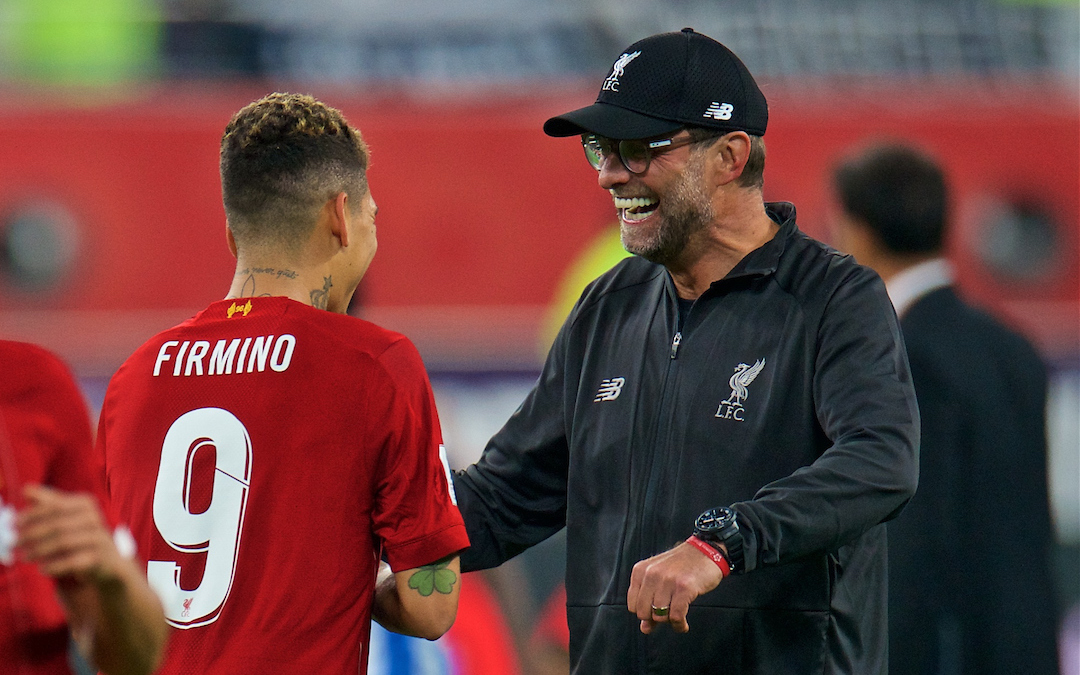 DOHA, QATAR - Wednesday, December 18, 2019: Liverpool's manager Jürgen Klopp (R) celebrates with match-winning goal-scorer Roberto Firmino after the FIFA Club World Cup Qatar 2019 Semi-Final match between CF Monterrey and Liverpool FC at the Khalifa Stadium. Liverpool won 2-1. (Pic by Peter Powell/Propaganda)