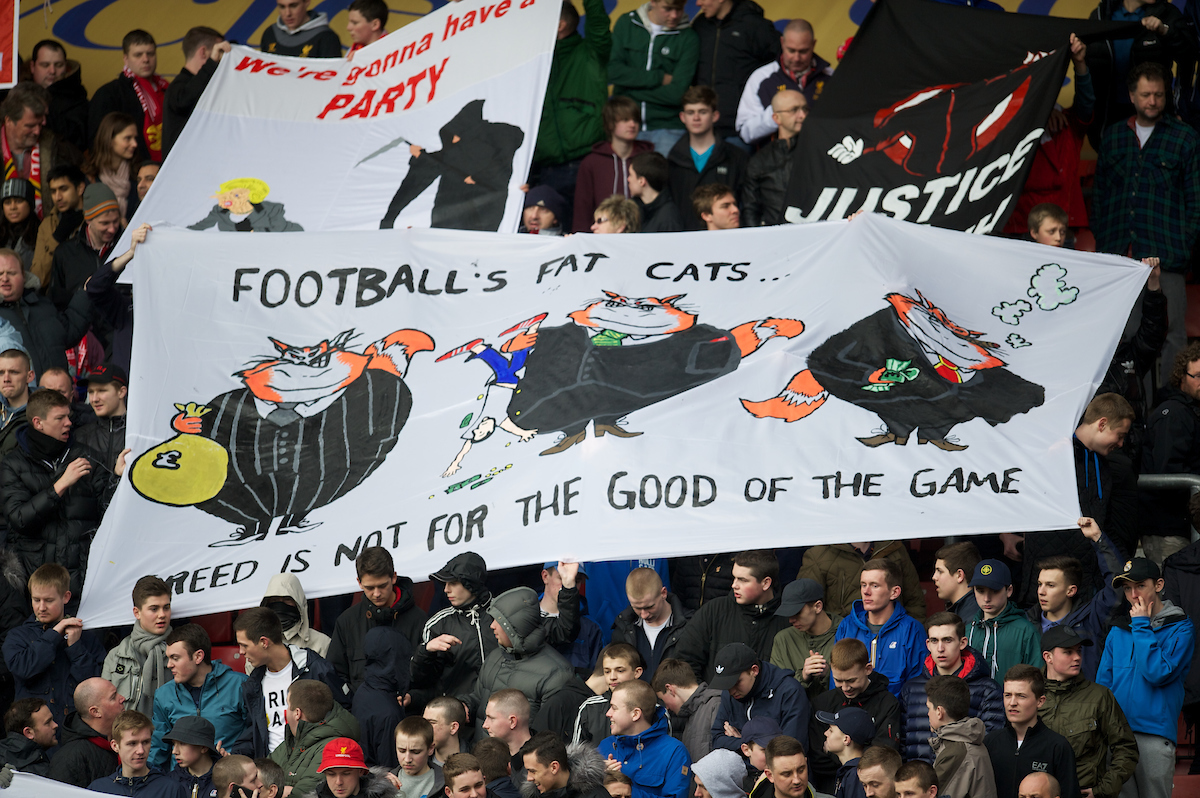 SOUTHAMPTON, ENGLAND - Saturday, March 16, 2013: Liverpool supporters protest at the high ticket prices with a banner 'Football's Fat Cats? Greed Is Not For The Good Of The Game' before the Premiership match against Southampton at St. Mary's Stadium. (Pic by David Rawcliffe/Propaganda)