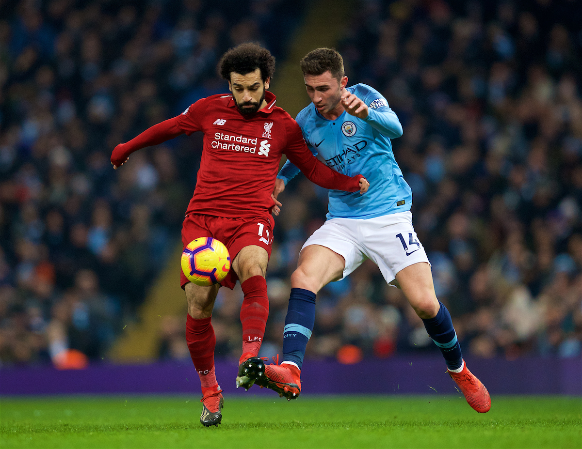 MANCHESTER, ENGLAND - Thursday, January 3, 2019: Liverpool's Mohamed Salah (L) and Manchester City's Aymeric Laporte (R) during the FA Premier League match between Manchester City FC and Liverpool FC at the Etihad Stadium. (Pic by David Rawcliffe/Propaganda)