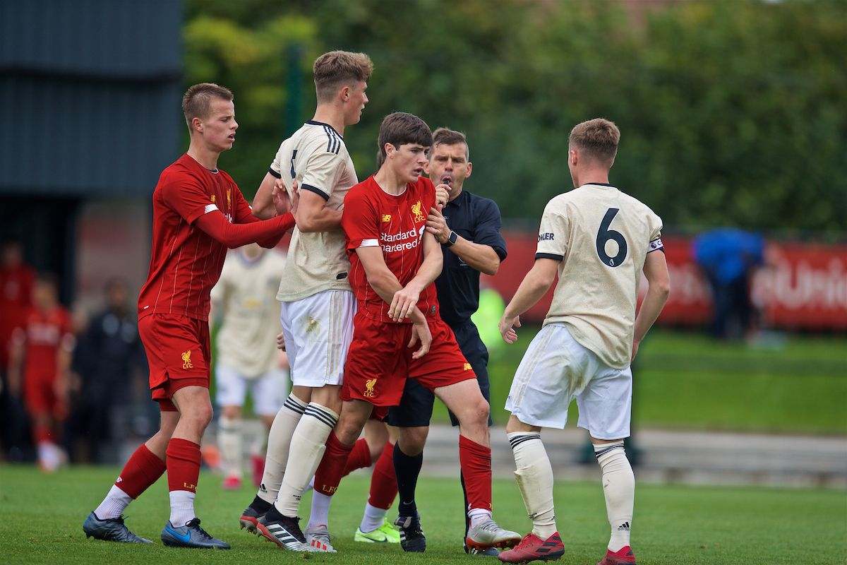 KIRKBY, ENGLAND - Saturday, August 31, 2019: Liverpool's Layton Stewart clashes with Manchester United's captain Charlie McCann after the Under-18 FA Premier League match between Liverpool FC and Manchester United at the Liverpool Academy. Liverpool won 4-3. (Pic by David Rawcliffe/Propaganda)