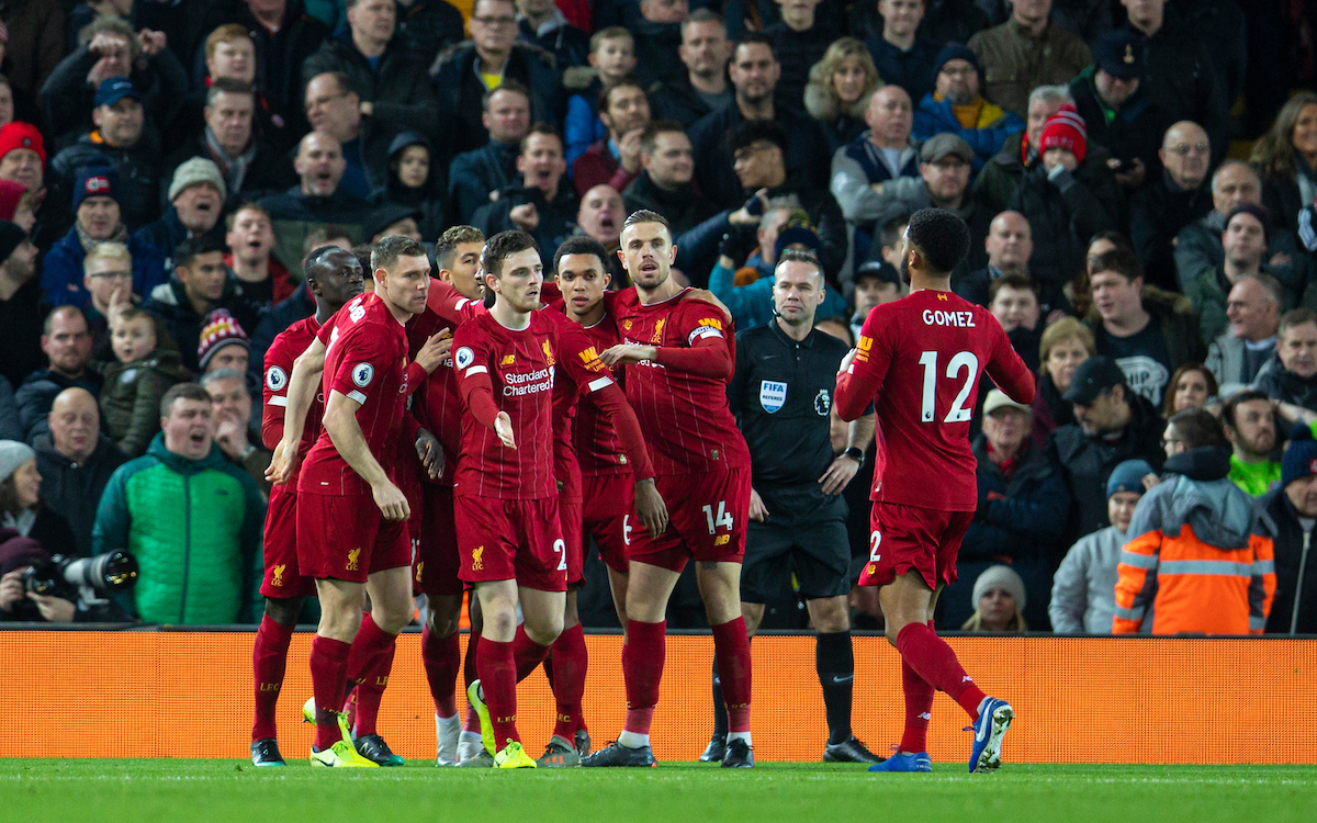 LIVERPOOL, ENGLAND - Thursday, January 2, 2020: Liverpool's Mohamed Salah (hidden) celebrates scoring the first goal with team-mates during the FA Premier League match between Liverpool FC and Sheffield United FC at Anfield. (Pic by David Rawcliffe/Propaganda)